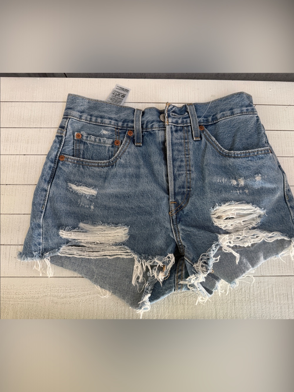 Distressed Levi’s Light Blue Denim Cutoff Shorts